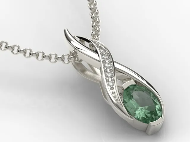 Wisiorek z białego złota ze szmaragdem i brylantami APW-69B