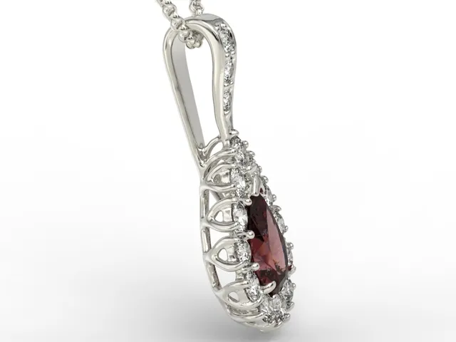 Wisiorek z białego złota z granatem i diamentami APW-29B