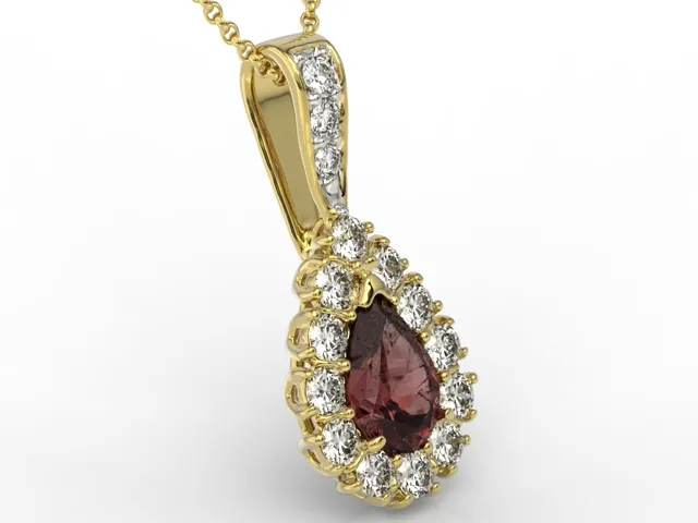 Wisiorek z żółtego złota z granatem i diamentami APW-29Z-R