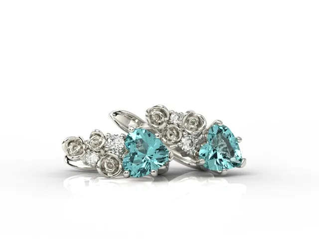 Kolczyki z białego złota z topazami niebieskimi w kształcie serca i diamentami APK-53B