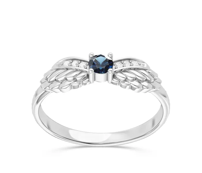 Pierścionek z białego złota z topazem London Blue i brylantami CP-62B
