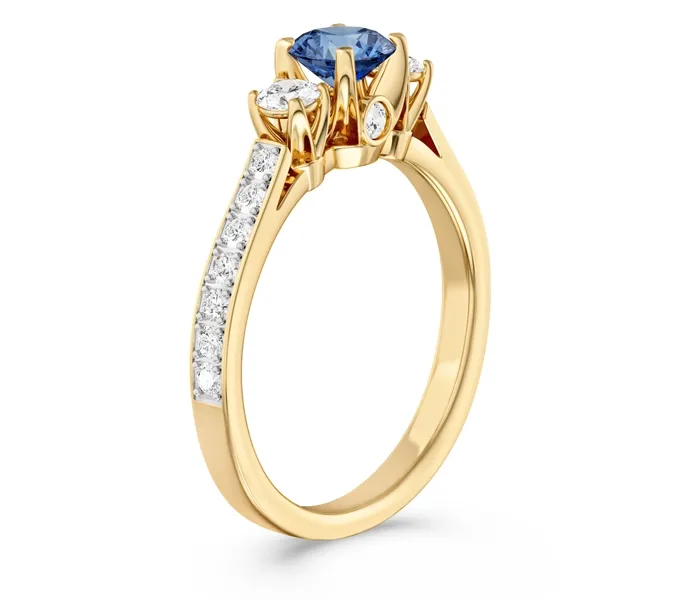 Pierścionek z żółtego złota z topazem London Blue i brylantami CP-31Z