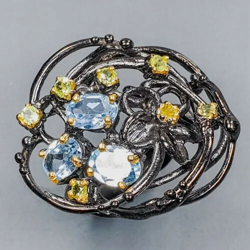 Artystyczny pierścionek topazy blue oliwiny r 15.5