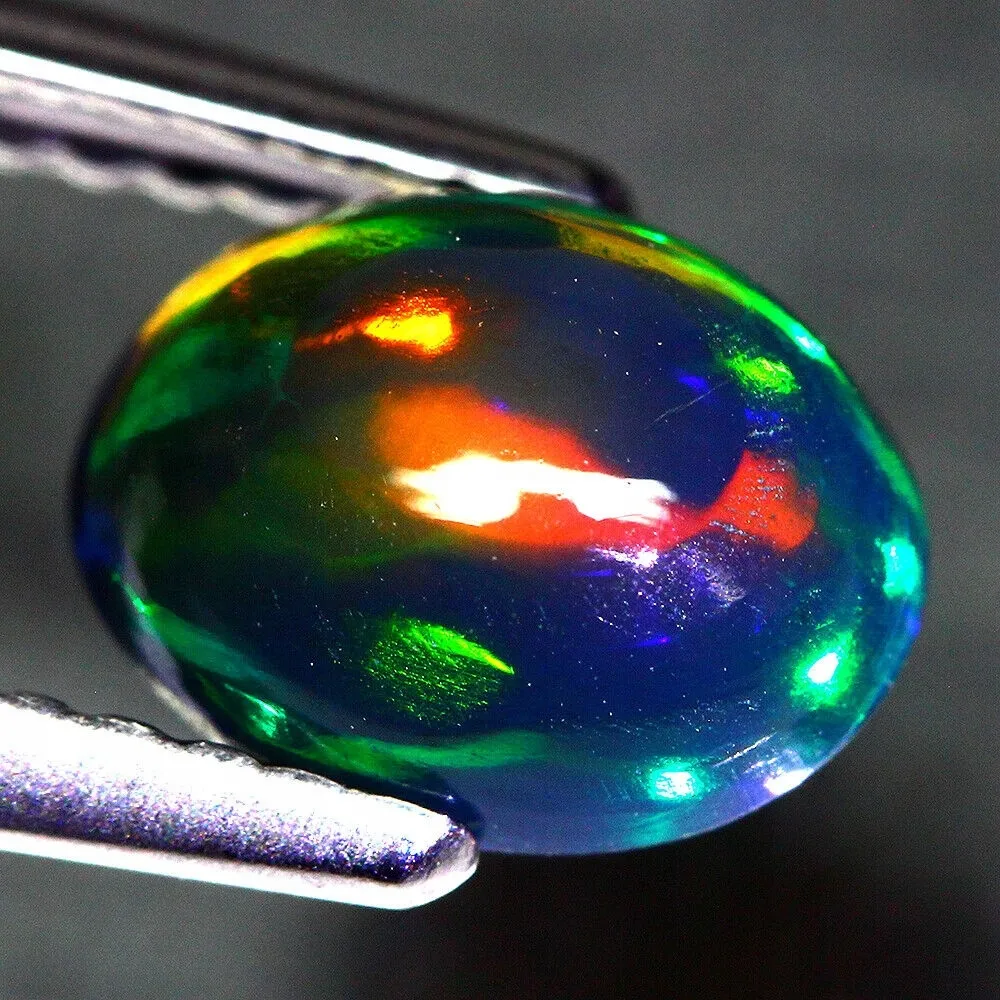 Opal czarny kamień naturalny 0.9ct AAA