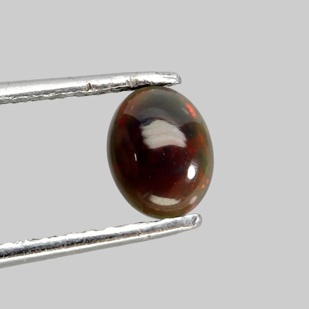 Opal czarny kamień naturalny 0.6ct IF AAA