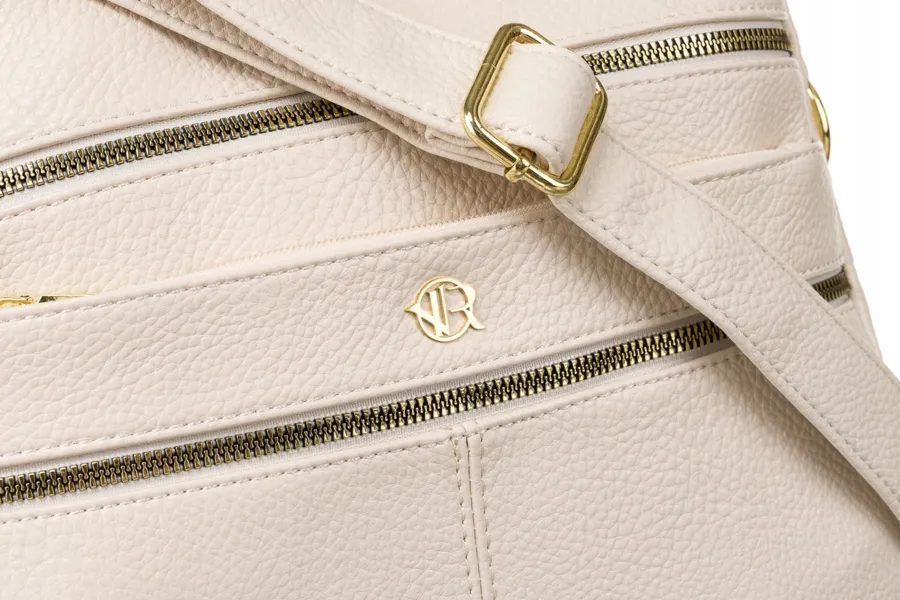 Damska listonoszka ze skóry ekologicznej w beżowym kolorze na długim pasku - Rovicky