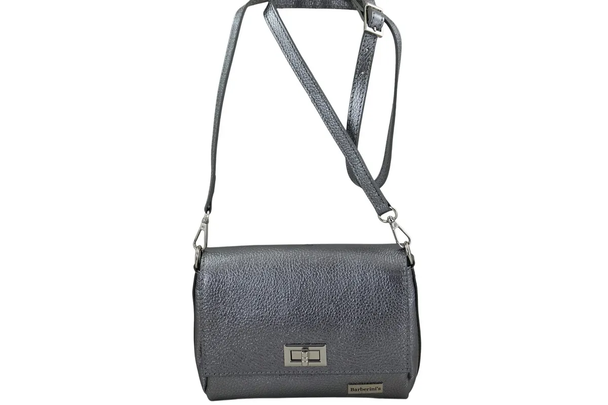 Elegancka torebka damska skórzana w ciemnym srebrze Skórzana torebka damska metalizowana w ciemnym srebrze, elegancka i funkcjonalna na różne okazje